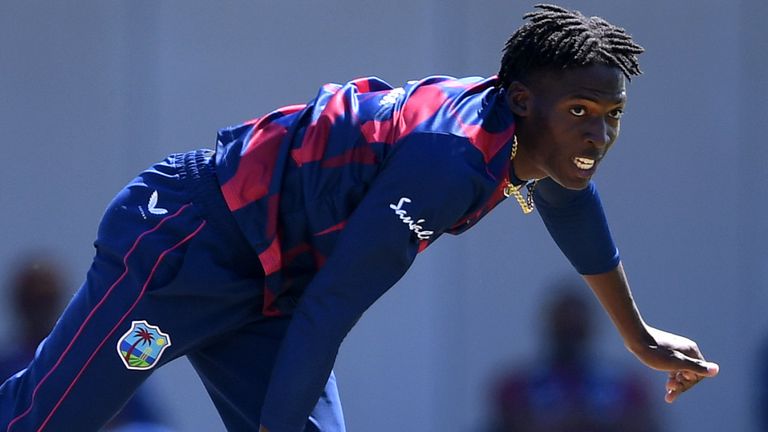 Chemar Holder in action in West Indies warm-up game