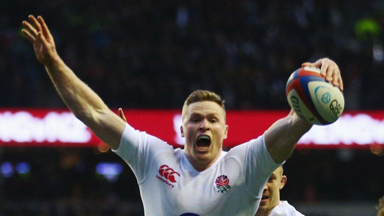 Chris Ashton of England goes over to score a try