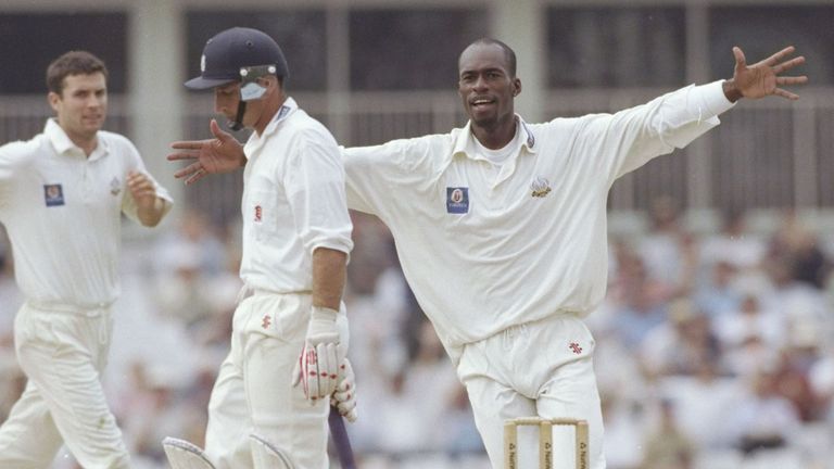 Chris Lewis takes the wicket of England team-mate Nasser Hussain during the NatWest semi final between Essex and Surrey in 1996