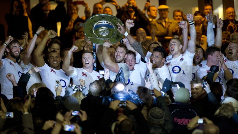 Chris Robshaw (C) lifts the Hillary Shield after defeating New Zealand