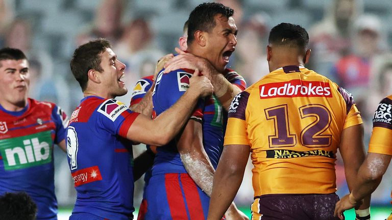 Daniel Saifiti celebrates his try for the Knights against the Broncos