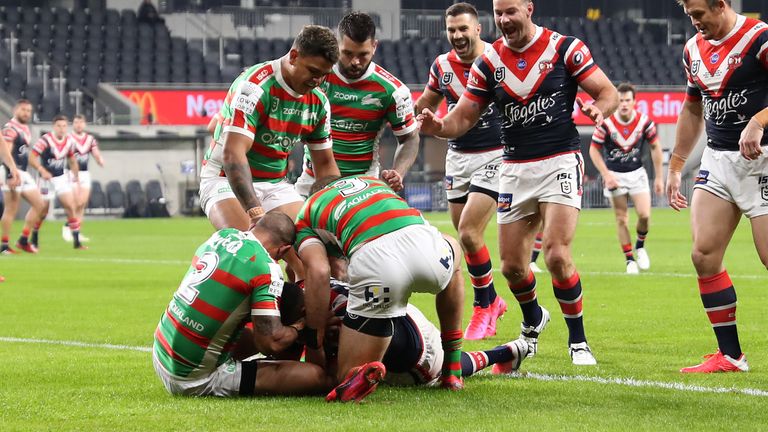SYDNEY, AUSTRALIA - MAY 29: The Roosters celebrate a try scored by Daniel Tupou of the Roosters during the round three NRL match between the Sydney Roosters and the South Sydney Rabbitohs at Bankwest Stadium on May 29, 2020 in Sydney, Australia. (Photo by Mark Kolbe/Getty Images)