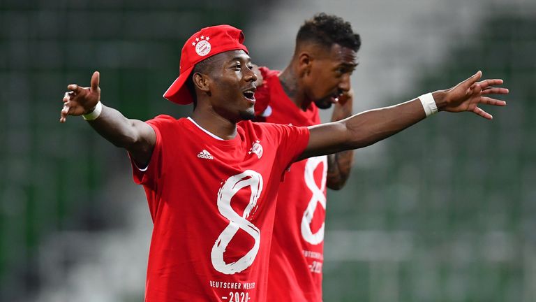 David Alaba wears the commemorative shirt on the pitch at the final whistle