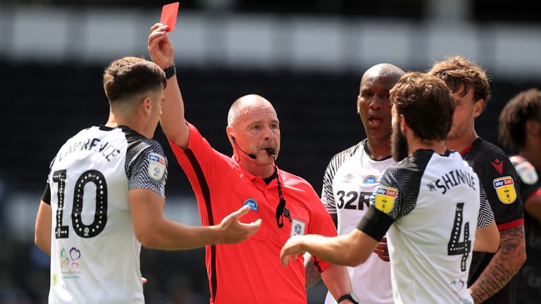 Derby County's Tom Lawrence is shown a red card by referee Scott Duncan during the Sky Bet Championship match at Pride Park, Derby. PA Photo. Issue date: Saturday June 27, 2020. See PA story SOCCER Derby. Photo credit should read: Mike Egerton/PA Wire. RESTRICTIONS: EDITORIAL USE ONLY No use with unauthorised audio, video, data, fixture lists, club/league logos or "live" services. Online in-match use limited to 120 images, no video emulation. No use in betting, games or single club/league/player publications.