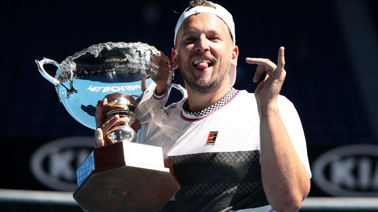 Dylan Alcott of Australia poses with the championship trophy following victory his Quad Wheelchair Singles Final match against David Wagner of the United States during day 13 of the 2019 Australian Open at Melbourne Park on January 26, 2019 in Melbourne, Australia.