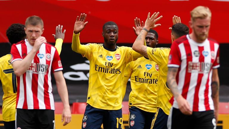 SHEFFIELD, ENGLAND - JUNE 28: Nicolas Pepe of Arsenal scores his sides first goal from the penalty spot during the FA Cup Fifth Quarter Final match between Sheffield United and Arsenal FC at Bramall Lane on June 28, 2020 in Sheffield, England. (Photo by Andrew Boyers/Pool via Getty Images)