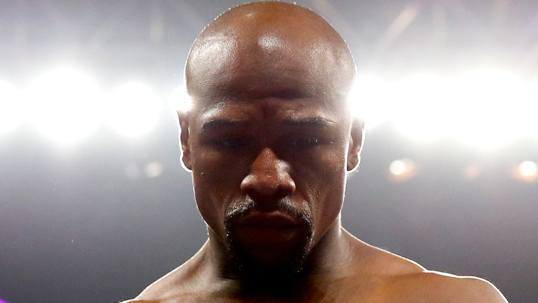 Floyd Mayweather Jr. throws a right at Manny Pacquiao during their welterweight unification championship bout on May 2, 2015 at MGM Grand Garden Arena in Las Vegas, Nevada. 