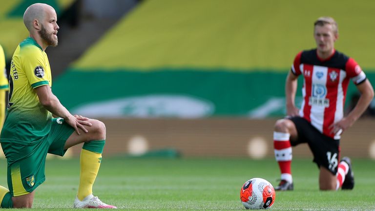 Norwich and Southampton players take a knee after kick-off