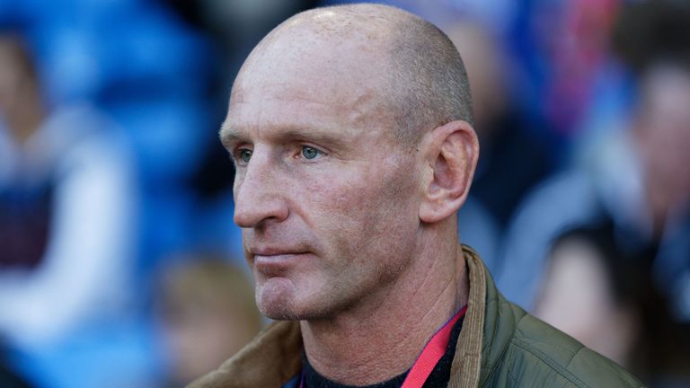 Former Wales international rugby player Gareth Thomas stands at the side of the pitch during the Premier League match between Cardiff City and Fulham FC at the Cardiff City Stadium on October 20, 2018 in Cardiff, Wales.