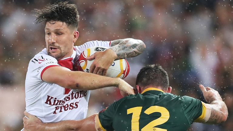 England's Gareth Widdop is tackled by Matt Gillett of Australia during the 2017 Rugby League World Cup final