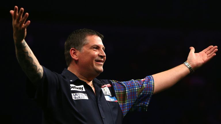 Gary Anderson celebrates winning his semi-final match against Dave Chisnall during the Premier League at The 02 Arena