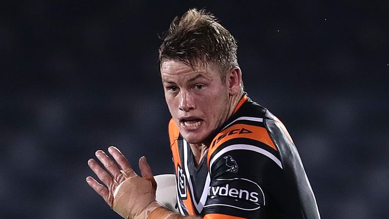 SYDNEY, AUSTRALIA - JUNE 20: Harry Grant of the Tigers makes a break during the round six NRL match between the Wests Tigers and the North Queensland Cowboys at Campbelltown Stadium on June 20, 2020 in Sydney, Australia. (Photo by Mark Metcalfe/Getty Images)