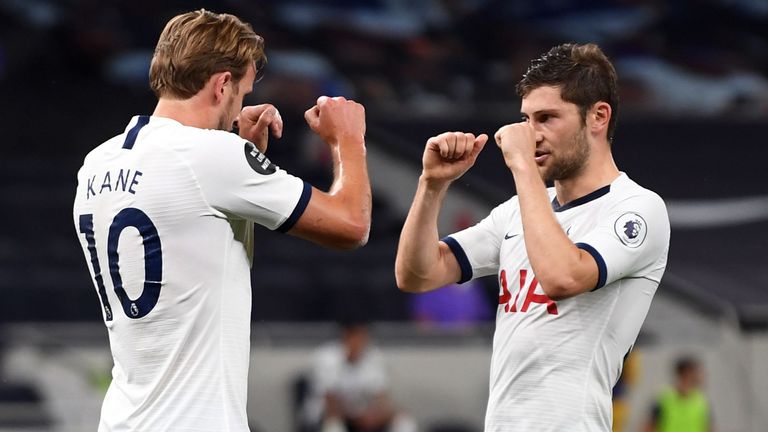 Harry Kane celebrates scoring with Ben Davies for Spurs against West Ham