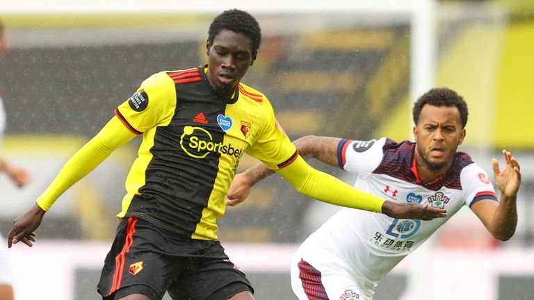 Ismaila Sarr shields the ball from Southampton defender Ryan Bertrand