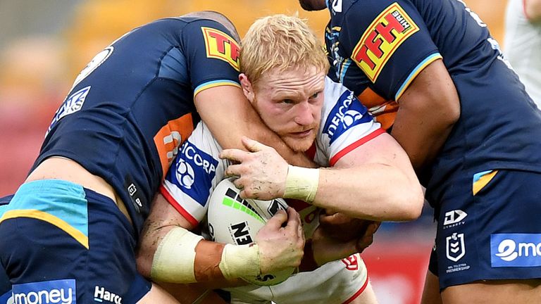 BRISBANE, AUSTRALIA - JUNE 20: James Graham of the Dragons is tackled during the round six NRL match between the Gold Coast Titans and the St George Illawarra Dragons at Suncorp Stadium on June 20, 2020 in Brisbane, Australia. (Photo by Bradley Kanaris/Getty Images)