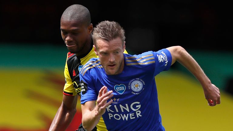 Leicester's Jamie Vardy is challenged by Watford's Christian Kabasele