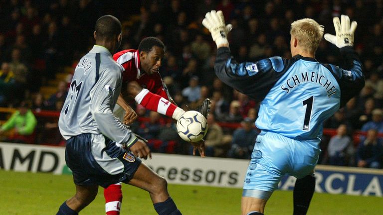 Charlton's Jason Euell up against Peter Schmeichel