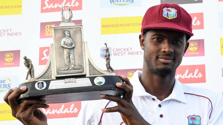 Jason Holder of West Indies holds the Wisden trophy at the end of day 4 of the 3rd and final Test between West Indies and England at Darren Sammy Cricket Ground, Gros Islet, Saint Lucia, on February 12, 2019. (