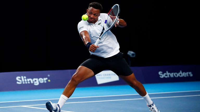 Jay Clarke plays a backhand during his match against Dan Evans on day 1 of Schroders Battle of the Brits at the National Tennis Centre on June 23, 2020 in London, England. 