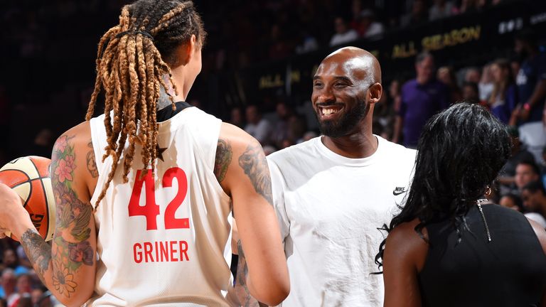 Kobe Bryant shares a joke with Brittney Griner at the 2019 WNBA All-Star Game
