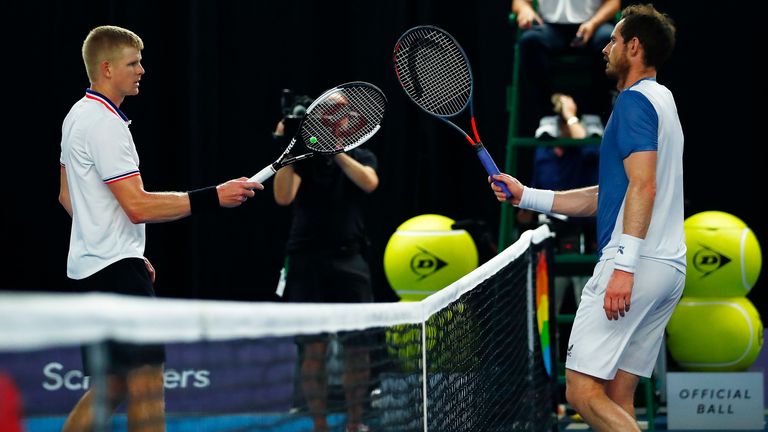 Kyle Edmund (l) touches racquets with Andy Murray after winning their singles match on day 2 of Schroders Battle of the Brits at the National Tennis Centre on June 24, 2020 in London, England. 