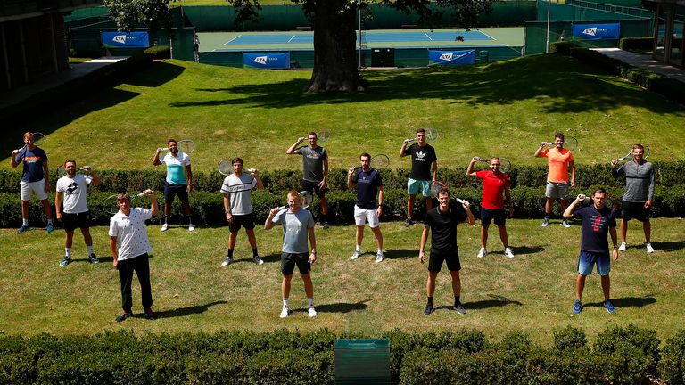Front row (l to r): Jack Draper, Kyle Edmund, Jamie Murray and Neal Skupski. Middle row (l to r): Liam Broady, Cameron Norrie, Andy Murray, Dan Evans and Lloyd Glasspool. Back row (l to r): Dominic Inglot, Jay Clarke, Joe Salisbury, James Ward, Jonny O’Mara pose for a group photo prior to Schroders Battle of the Brits at National Tennis Centre on June 22, 2020 in London, England.