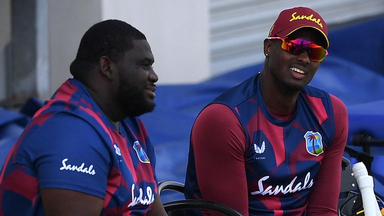 West Indies players Rahkeem Cornwall (left) and captain Jason Holder (right) at Emirates Old Trafford in Manchester