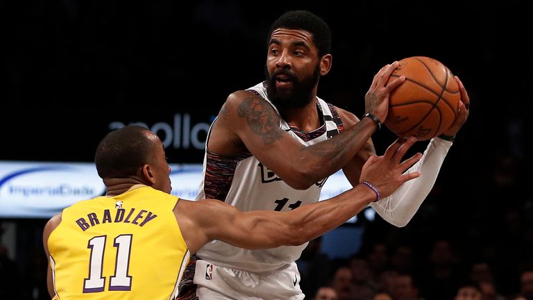 Kyrie Irving of the Brooklyn Nets in action against Avery Bradley of the Los Angeles Lakers 
