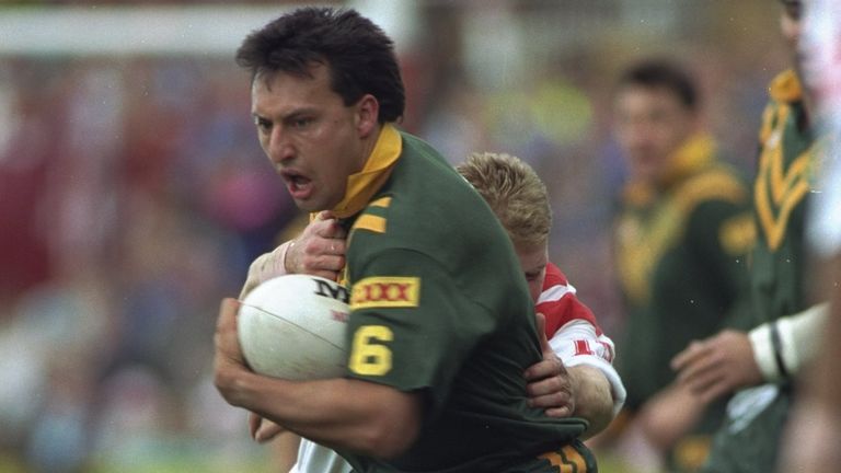 7 Oct 1990: Laurie Daley of Australia is tackled during a match against St Helens at Knowsley Road in St Helens, England. \ Mandatory Credit: Shaun Botterill/Allsport