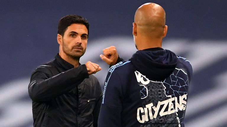 Manchester City manager Pep Guardiola and Arsenal manager Mikel Arteta after City's 3-0 victory