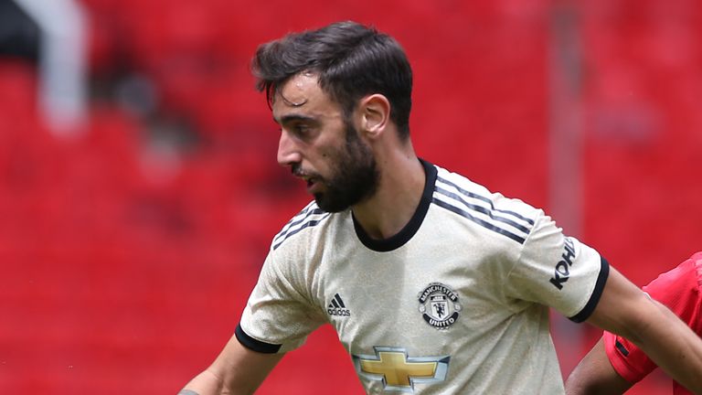 Bruno Fernandes carries the ball during a Manchester United first team training session at Old Trafford