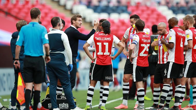 Manager of Exeter City, Matt Taylor reacts during a water break during the Sky Bet League Two Play Off Final between Exeter City v Northampton Town at Wembley Stadium on June 29, 2020 in London, England