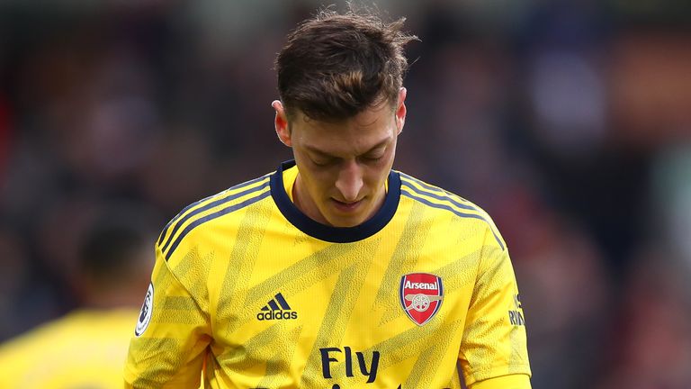 Midfielder Mesut Ozil earns a reported £350,000 a week at Arsenal