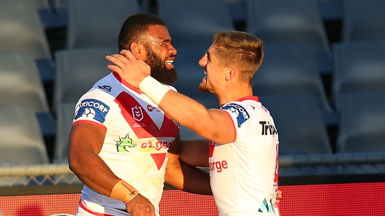 Mikaele Ravalawa  celebrates with Zac Lomax of the s after scoring a try
