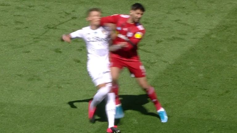 Aleksandar Mitrovic was involved in an off-the-ball incident with Leeds' Ben White barely two minutes into the game