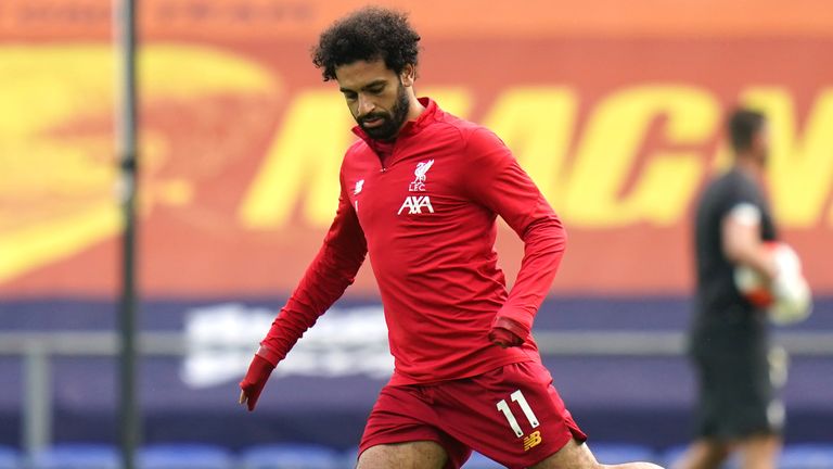 Mo Salah warms up ahead of the Merseyside derby