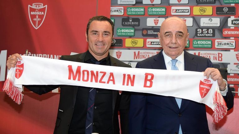 Monza manager Cristian Brocchi (left) and chairman Adriano Galliani (right) celebrate the club's promotion to Serie B