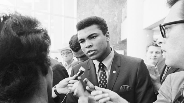 Muhammad Ali talking with the press after being indicted by a Federal Grand Jury for his refusal to be inducted into the armed forces