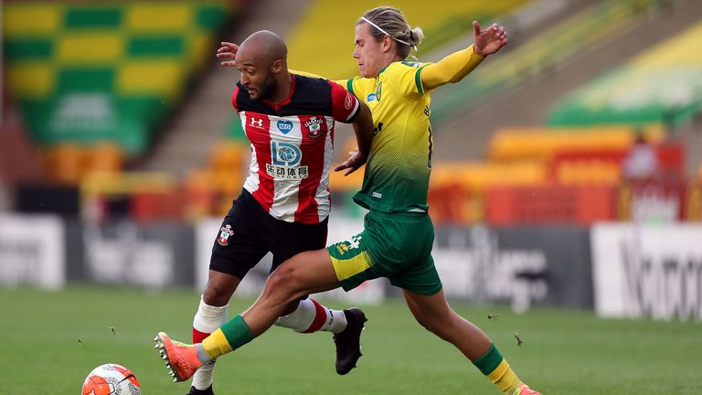 Southampton's Nathan Redmond (left) and Norwich City's Todd Cantwell battle for the ball 