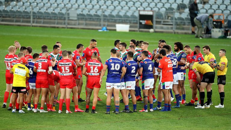 GOSFORD, AUSTRALIA - MAY 30: The Dragons thank the Warriors for their time away from home and their family at the conclusion of the match during the round three NRL match between the New Zealand Warriors and the St George Illawarra Dragons at Central Coast Stadium on May 30, 2020 in Gosford, Australia. (Photo by Mark Kolbe/Getty Images)