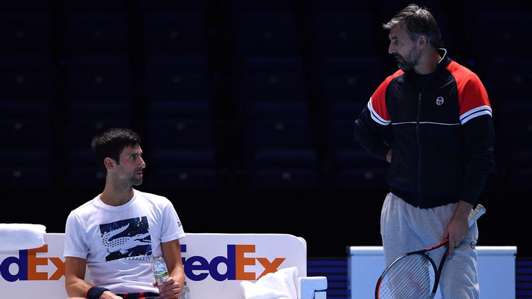 Novak Djokovic talks to coach Goran Ivanisevic