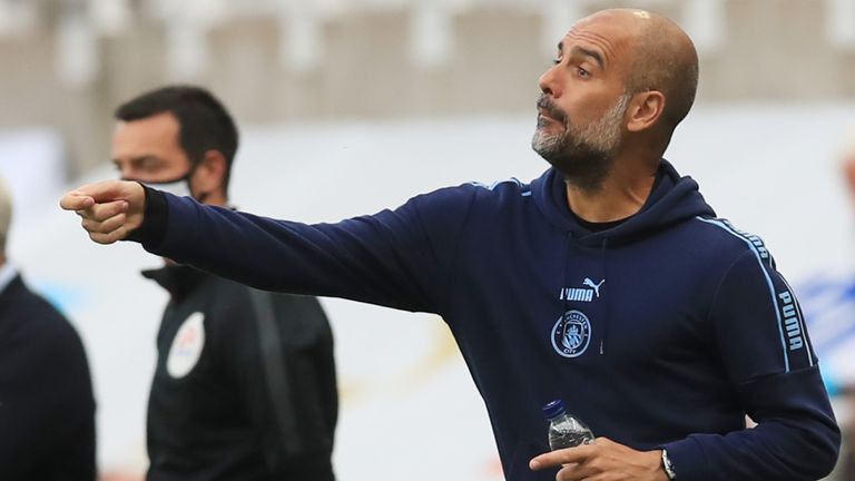 Pep Guardiola issues instructions during Man City's FA Cup quarter-final win at Newcastle
