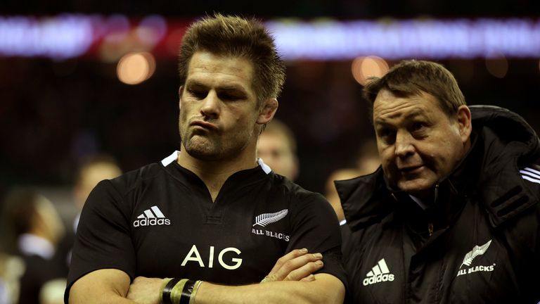 Richie McCaw and Steve Hansen look on after defeat to England