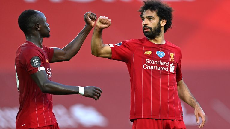 Sadio Mane and Mohamed Salah celebrate after Salah scores against Crystal Palace