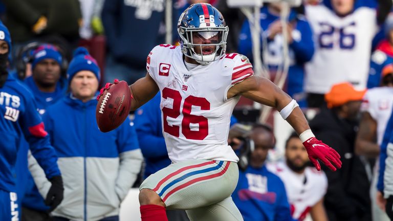 LANDOVER, MD - DECEMBER 22: Saquon Barkley #26 of the New York Giants carries the ball against the Washington Redskins during the second half at FedExField on December 22, 2019 in Landover, Maryland. (Photo by Scott Taetsch/Getty Images)