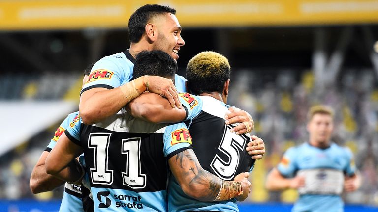 Cowboys NRL premiership defence begins with win over Sharks, NRL