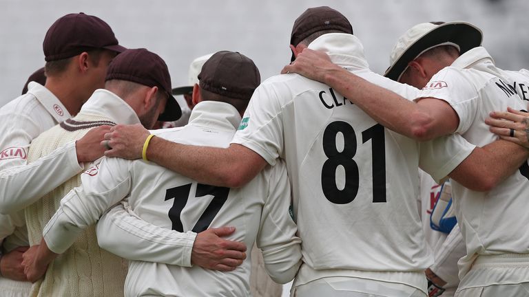 LONDON, ENGLAND - JUNE 23: Surrey players huddle before the start of the second innings on day 1 of the Specsavers County Championship match in Division One between Surrey and Warwickshire at The Kia Oval on June 23, 2019 in London, England. (Photo by Sarah Ansell/Getty Images for Surrey CCC)