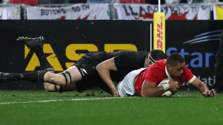 Taulupe Faletau  dives over to score the opening try for the Lions in the first Test