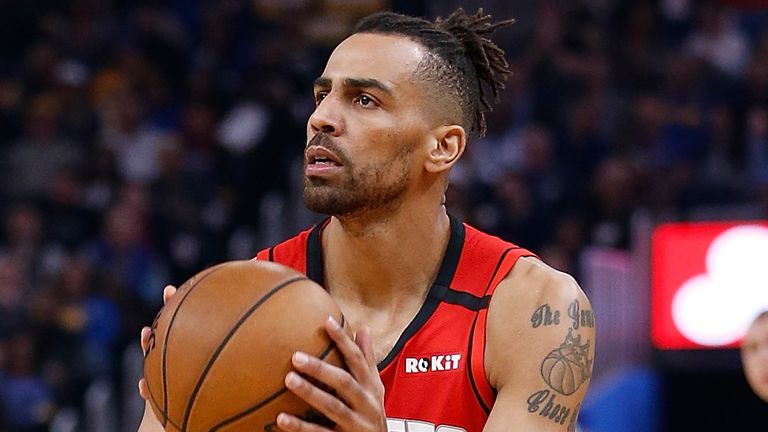 Thabo Sefolosha sets to shoot during a Rockets game