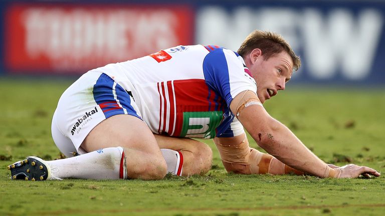 SYDNEY, AUSTRALIA - MAY 31: Tim Glasby of the Knights lies injured during the round three NRL match between the Penrith Panthers and the Newcastle Knights at Campbelltown Stadium on May 31, 2020 in Sydney, Australia. (Photo by Mark Kolbe/Getty Images)
